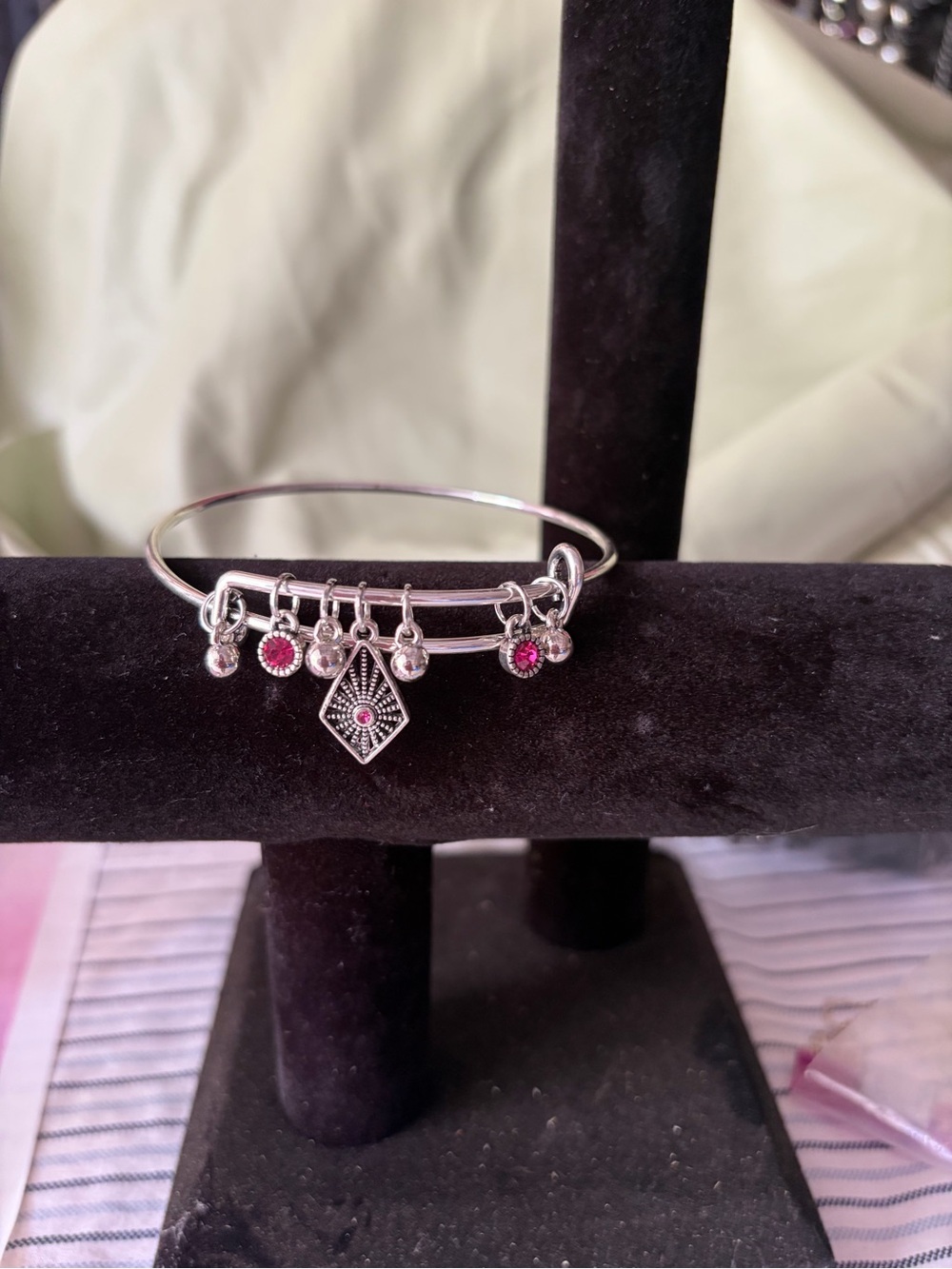 Silver-Tone Charm Bangle Bracelet with Pink Accents